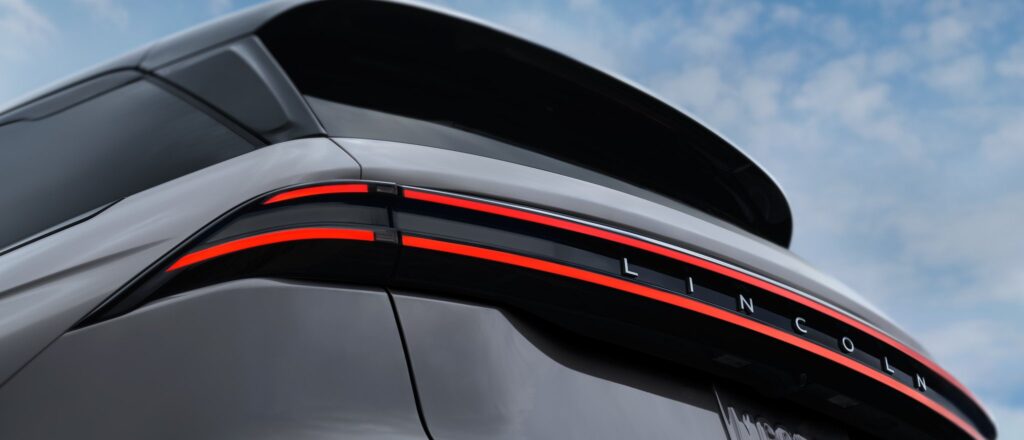 2027 Lincoln Nautilus low angle rear view of tail light bar against sky